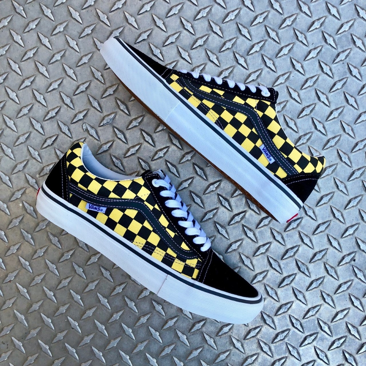 gold checkerboard vans