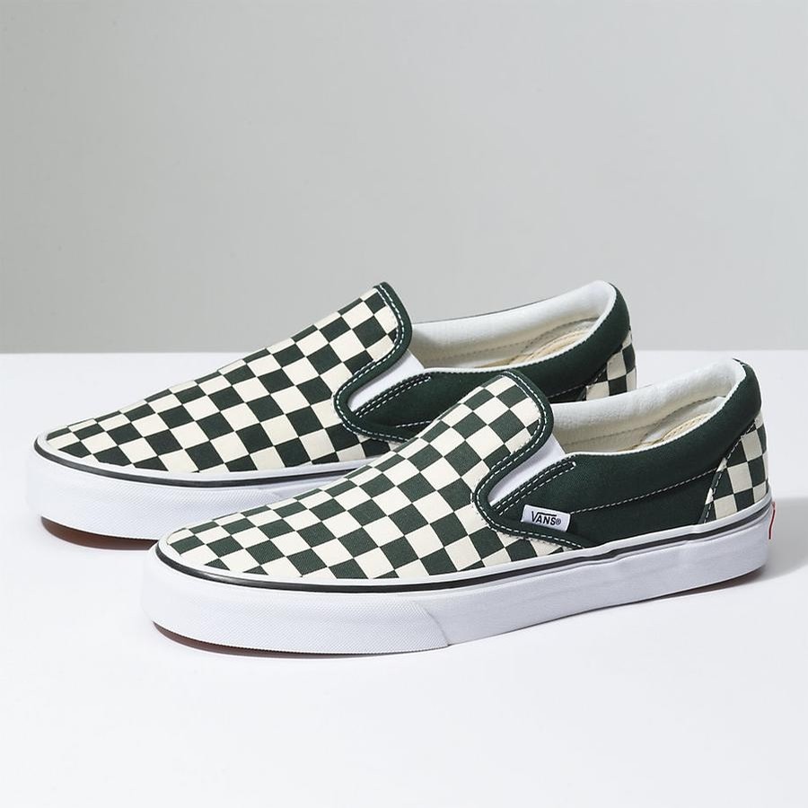 vans checkerboard slip ons black and white